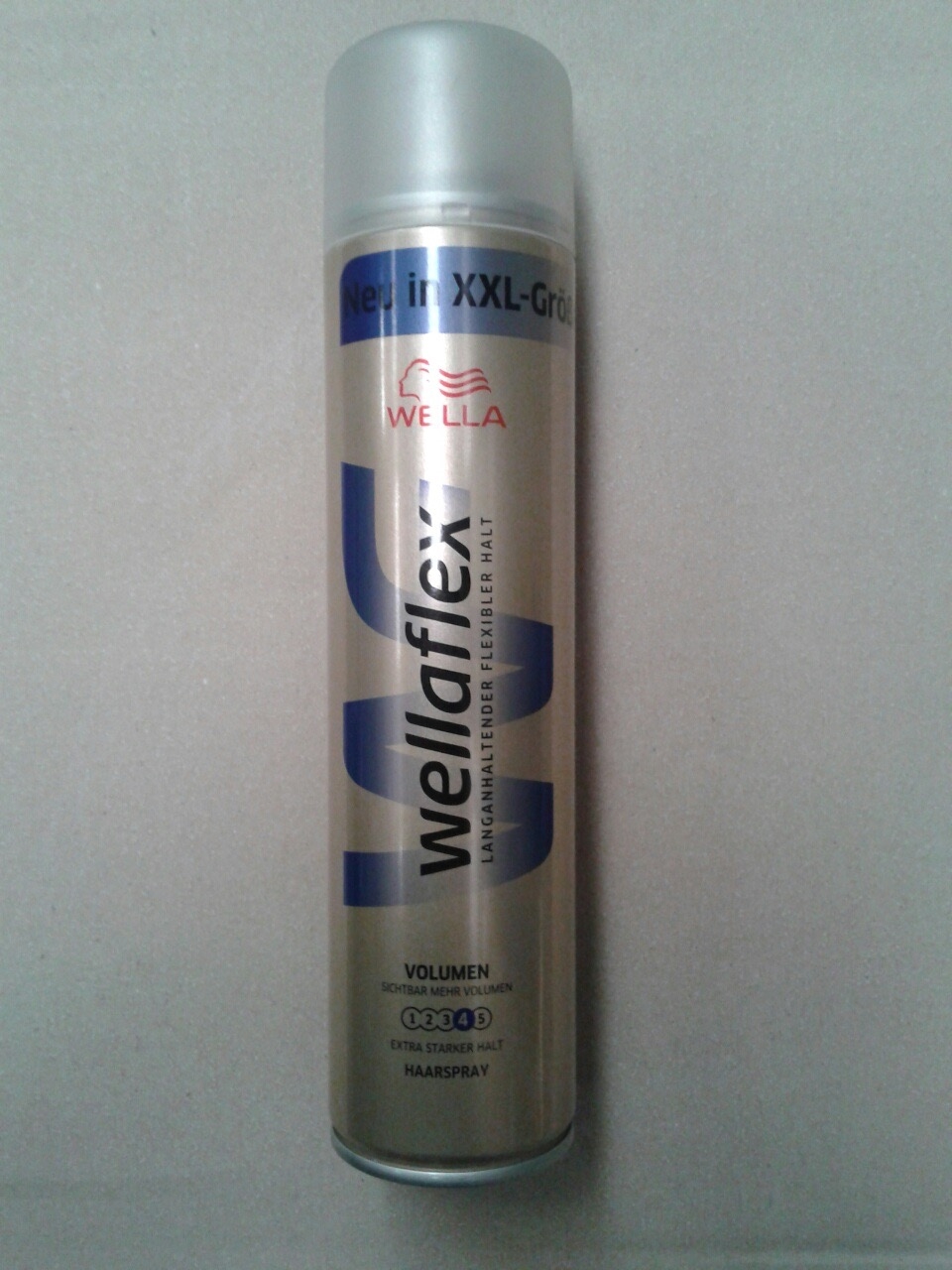 Picture of WellaFlex foam and hairspray